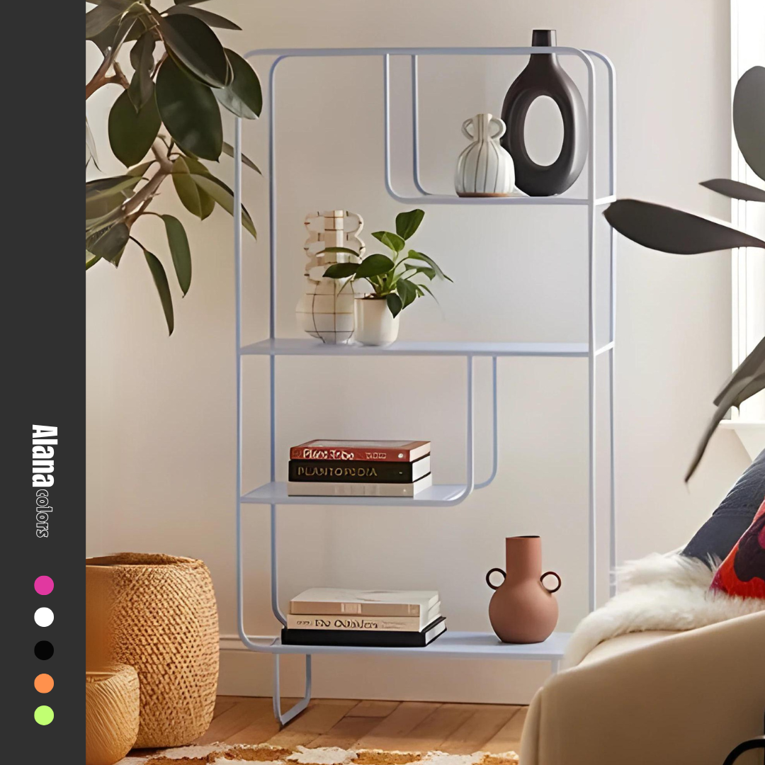 White metal Alana bookshelf from Urban Outfitters, displaying books, vases, and a speaker. Modern open shelving unit for home decor and storage in Lebanon.