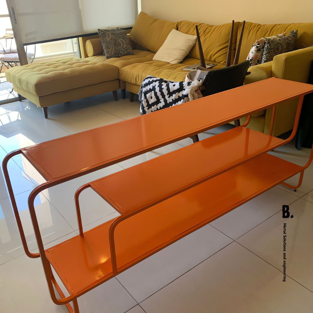 The Alana TV unit: modern design meets practical storage. Elevate your living room with its sleek metal frame and open shelving.