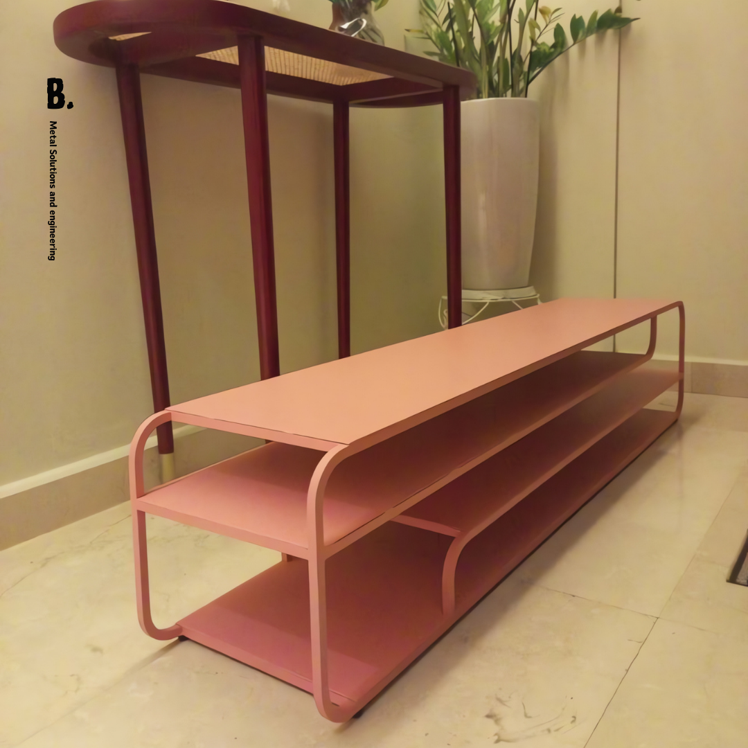 The Alana TV unit: modern design meets practical storage. Elevate your living room with its sleek metal frame and open shelving.