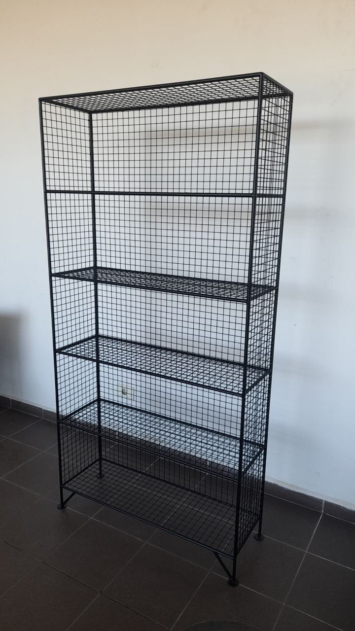 Black metal mesh shelving unit, Decorative metal shelving unit for plants and books.
