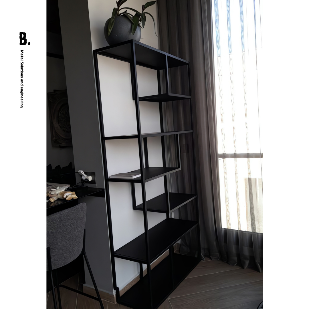 Modern duo bookshelf set by Black. Metal Solutions and Engineering, black metal frame with modular open shelves, displaying books and decorative items