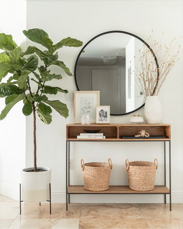 Modern console table with a light wood finish, black metal frame, lower shelf, and two top compartments.