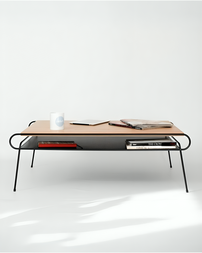 Close-up of HAY Mags Coffee Table. Detail of light wood tabletop, curved black metal frame, and black perforated metal shelf.