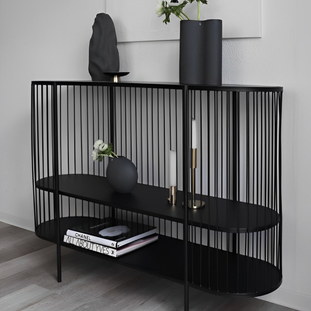 Modern black oval console table with a vertical rod design and two display shelves.