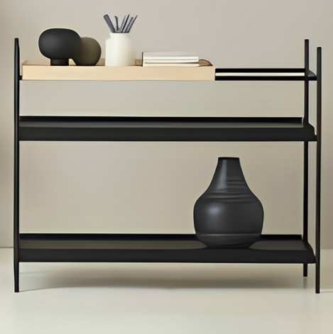 Wood Tray Shelf Low in black, featuring three lipped tray-style shelves displaying vases and a pot with dried grass.