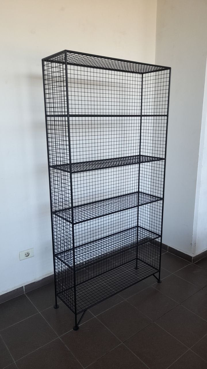 Black metal mesh shelving unit, Decorative metal shelving unit for plants and books.