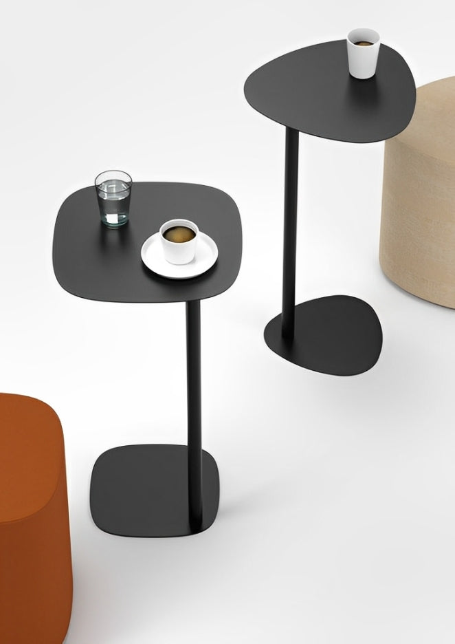 Set of two black Pully Side Tables showcasing their versatile and minimalist design.